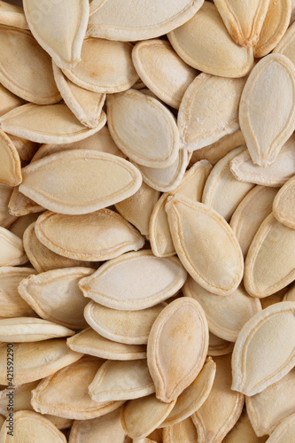 pumpkin seeds background. Macro background texture of pumpkin seeds