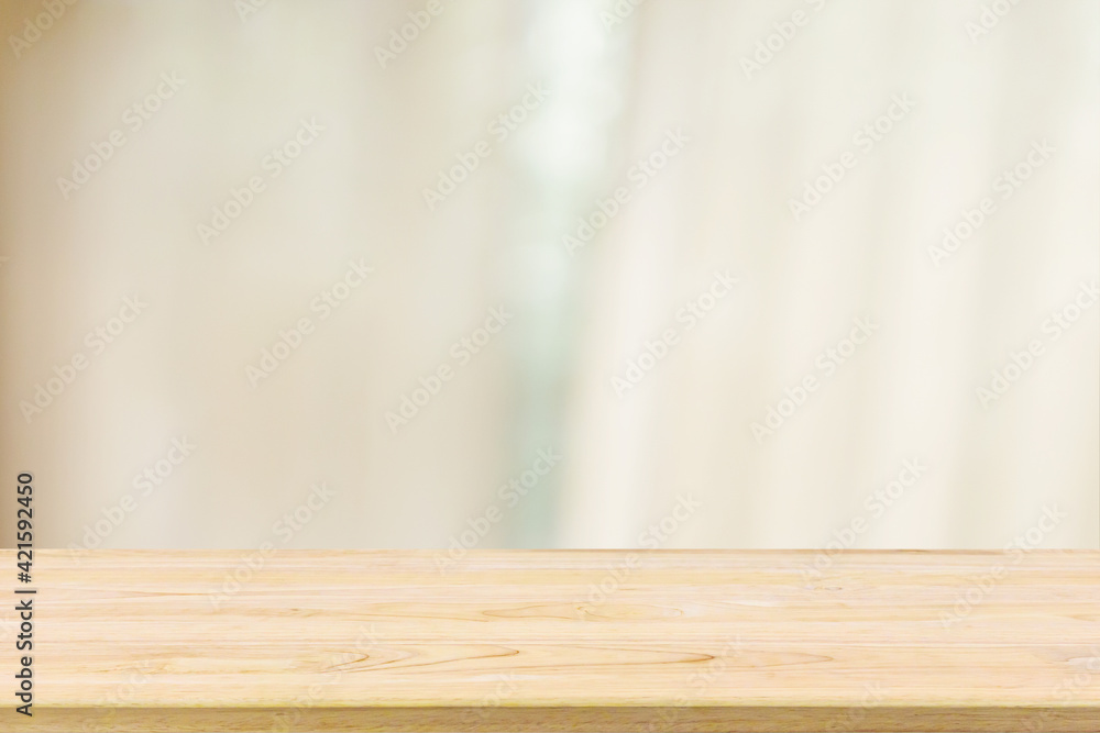 Empty wood table top with window curtain abstract blur background for product display Empty wood table top with window curtain abstract blur background for product display