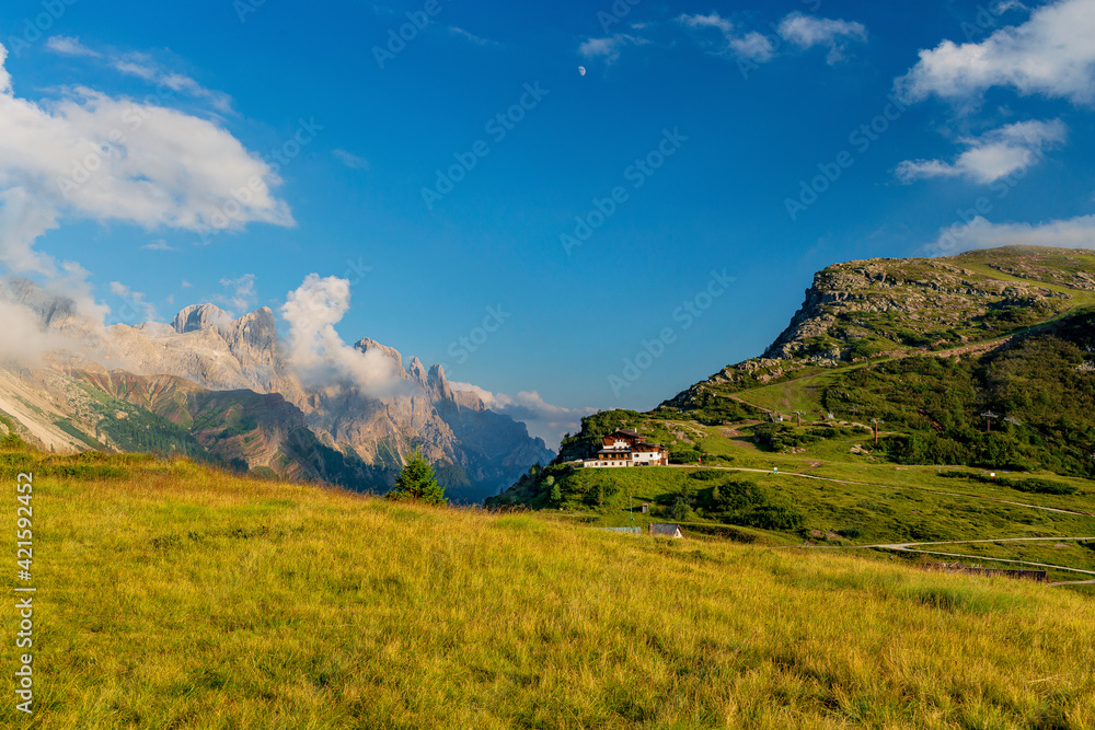 Fototapeta premium Very beautiful view of the evening mountains Pale di San Martino village with Dolomite peaks in Val di Primiero Noana of Trentino Alto-Adige