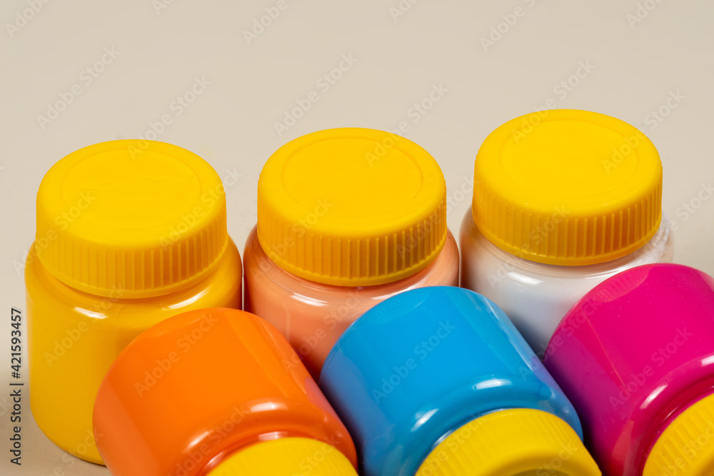 3 tubes of gouache paint lined up and lying down 3 tubes of gouache paint lined up and lying down