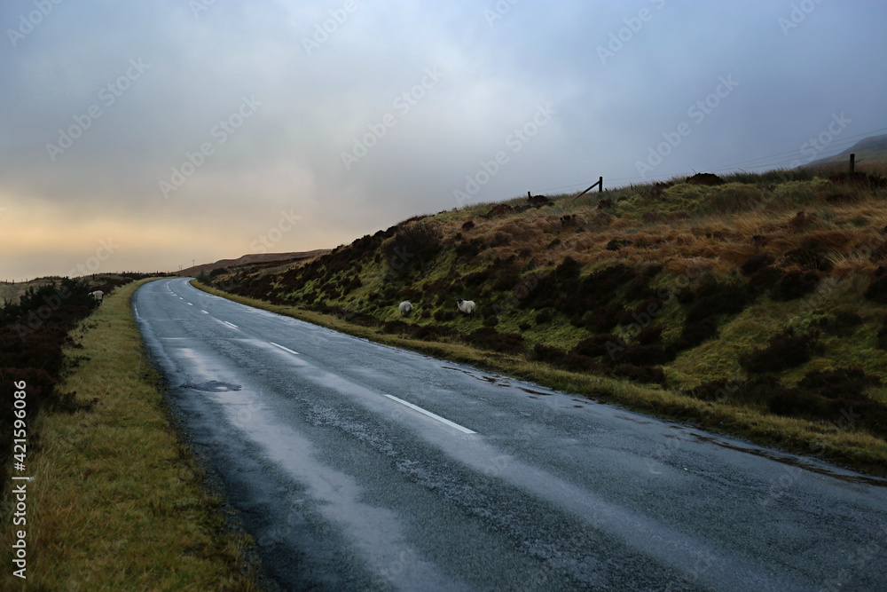 Narrow road on the Isle of Skye in Scotland