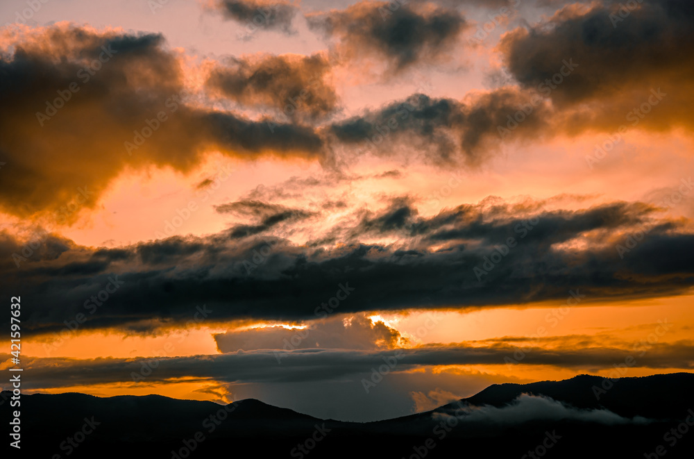 sunset over the mountains sunset over the mountains