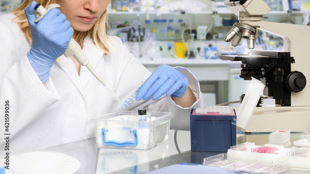 Young female tech or scientist works in research facility Young female tech or scientist works in research facility