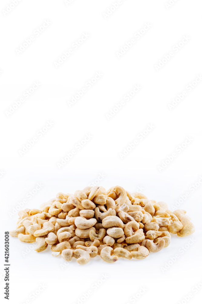 Cashew nut. Raw cashew nut isolated on white background. Heap of cashew nut on white background. Cashew nut. Raw cashew nut isolated on white background. Heap of cashew nut on white background.