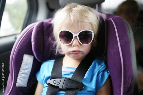 Obraz na płótnie Little Toddler Child Pouting in Car Seat