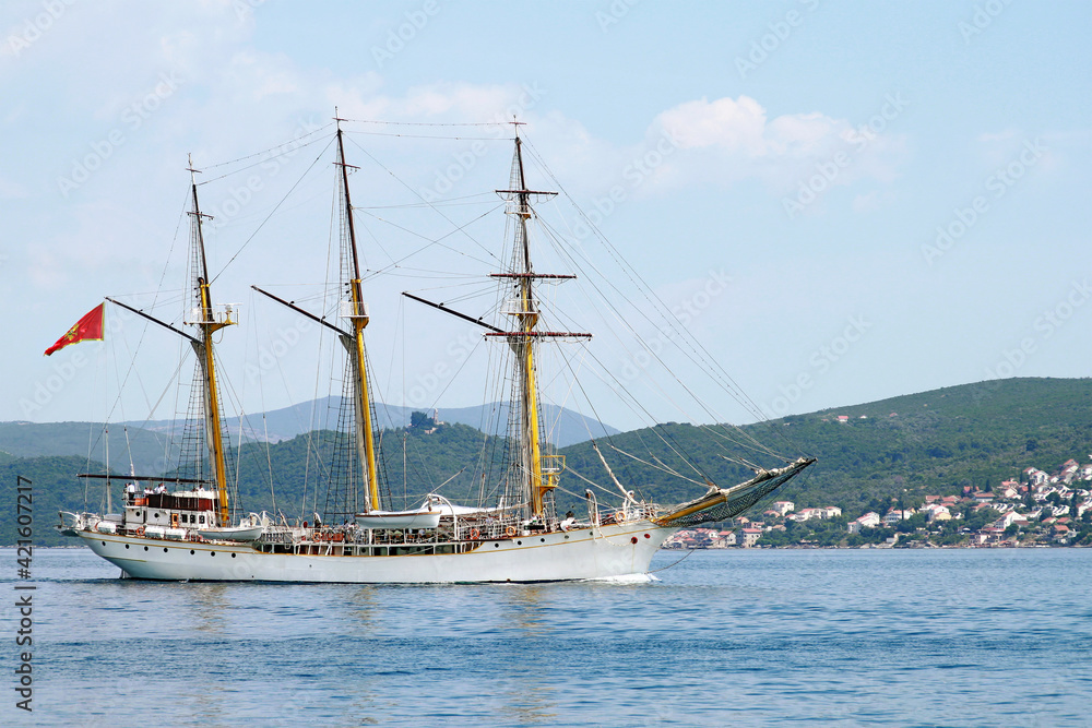 Old sailing ship floats in the sea near Tivat, Montenegro