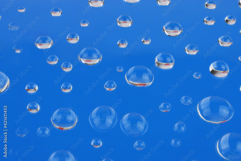Background, water drops on blue background.