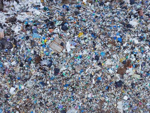 Aerial top view photo of large garbage pile at solid waste landfill