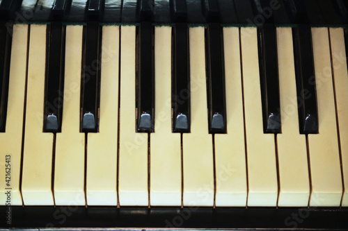 piano keyboard, art acoustic wooden old instrument black and white for playing music