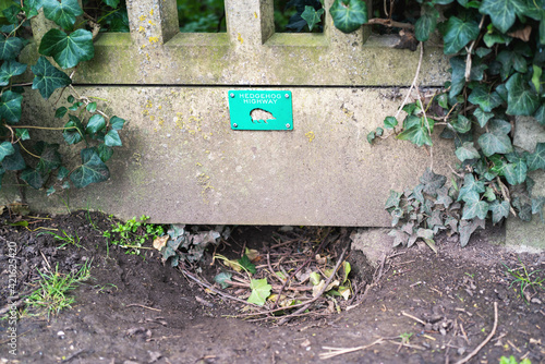 A sign indicating a route left open for hedgehogs to move between gardens for conservation