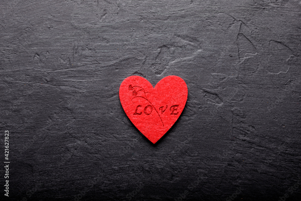 Beautiful valentines day background with red hearts on black background. Card for Valentine's Day. Love concept. Beautiful valentines day background with red hearts on black background. Card for Valentine's Day. Love concept.