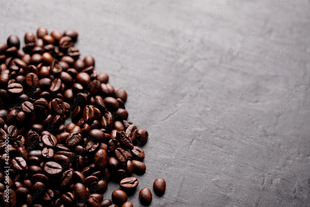 Roasted coffee beans, top view of coffee beans. Roasted coffee beans background Roasted coffee beans, top view of coffee beans. Roasted coffee beans background