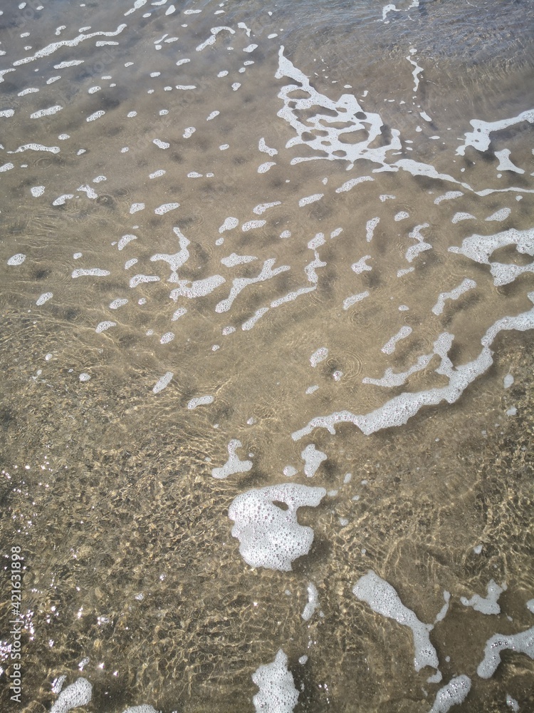 clear sea water and sand at the beach clear sea water and sand at the beach