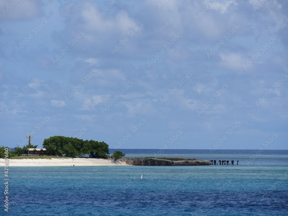 White sand beaches with the old dock at Fort Jefferson, Dry Tortugas National Park.