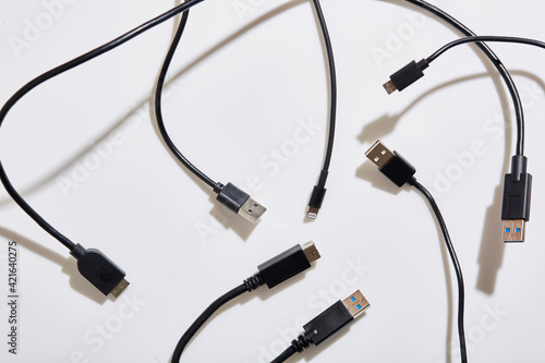 USB cables on white background photo