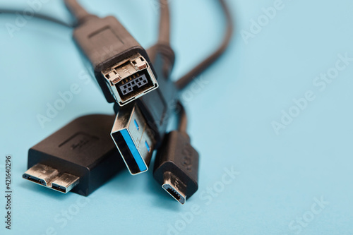 USB cables on blue background