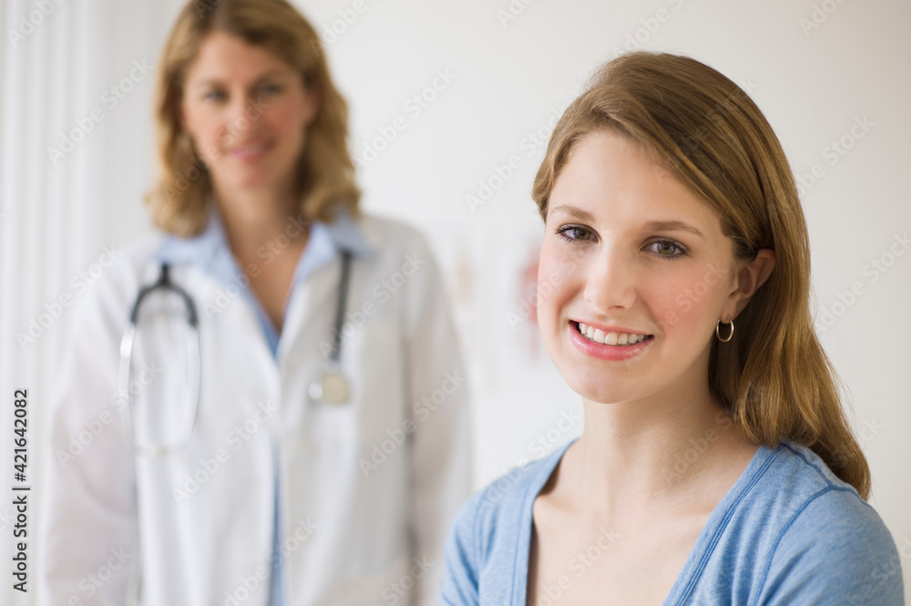 Doctor and patient in exam room Doctor and patient in exam room