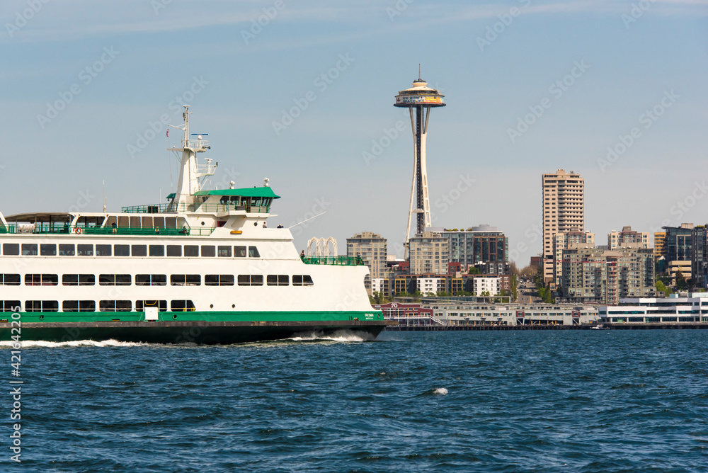 USA, Washington State, Seattle. Space Needle under renovation (spacelift banner) Washington State ferry in Elliott Bay