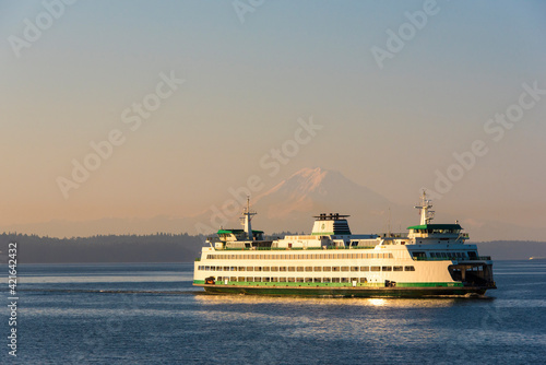 Fototapeta Naklejka Na Ścianę i Meble -  USA, Washington State, Puget Sound. Seattle Bainbridge ferry framing Mount Rainier on calm morning crossing.