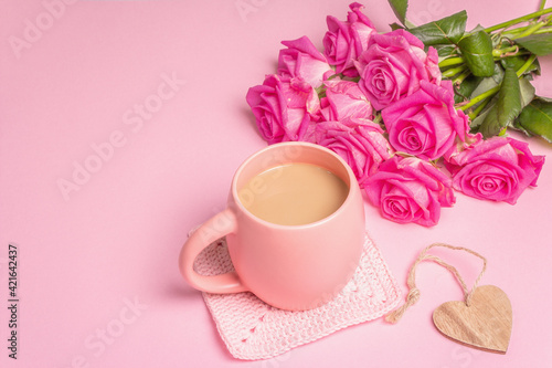 Morning coffee with a beautiful bouquet of roses