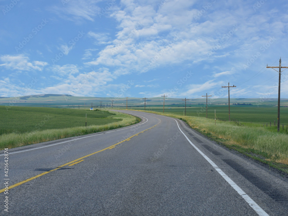 Scenic landscape along a winding road in Idaho, USA.