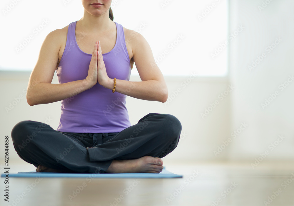 Young woman meditation in lotus position Young woman meditation in lotus position