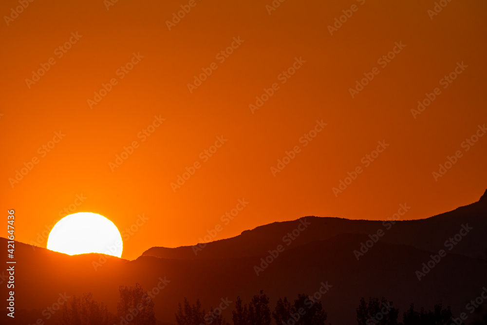 USA, Idaho, Bellevue, Sun rising behind mountain USA, Idaho, Bellevue, Sun rising behind mountain
