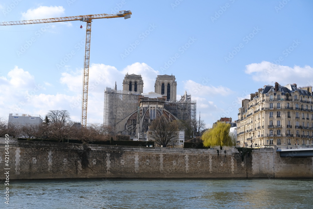 Notre Dame  during reconstruction under a blue sky. march 2021.