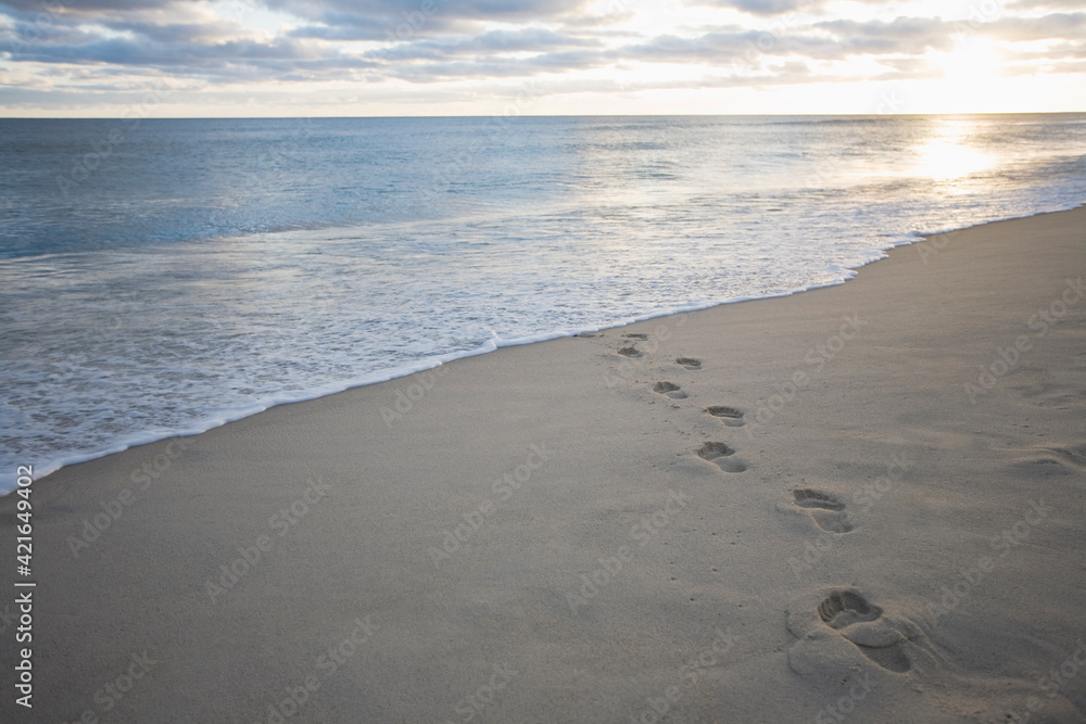 USA, Massachusetts, Cape Cod, footprints on beach at sunset USA, Massachusetts, Cape Cod, footprints on beach at sunset