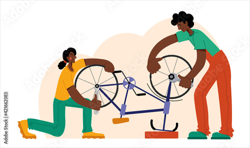 People are repairing a bicycle. Bicycle repair. The mechanic repairs the bicycle, the mechanic inflates the wheels. Web graphics, banners, advertisements, business templates.