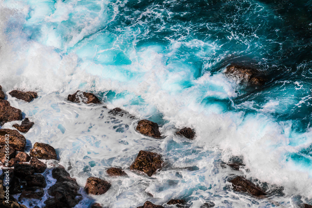 Waves Crashing Against The Rocky Shoreline of Papanalohoa Point, Maui, Hawaii, UISA