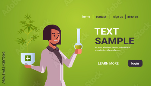 female scientist researcher testing cbd hemp oil extracted from a marijuana plant healthcare pharmacy from medical cannabis pharmaceutical industry concept horizontal portrait copy space