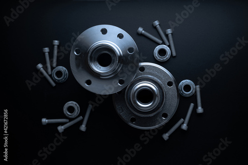 Mechanic part. Set of new metal car part. Auto motor mechanic spare or automotive piece isolated on black background. Automobile engine service with space for text.