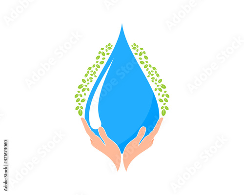 Hand care with water drop and green leaves