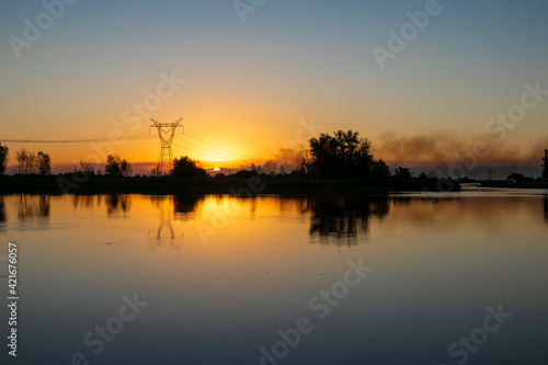 beautiful postcard of a sunset in a river in Argentina