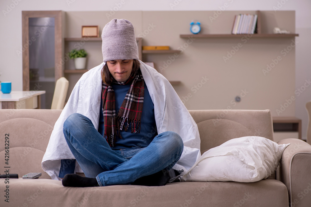 Young man suffering at home Young man suffering at home