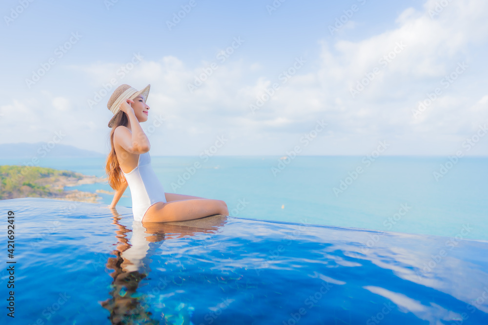 Portrait beautiful young asian woman relax smile leisure around outdoor swimming pool Portrait beautiful young asian woman relax smile leisure around outdoor swimming pool