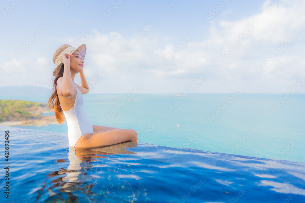 Portrait beautiful young asian woman relax smile leisure around outdoor swimming pool Portrait beautiful young asian woman relax smile leisure around outdoor swimming pool