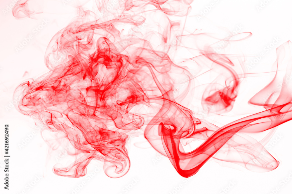 Movement of smoke, abstract red smoke on white background, ink water