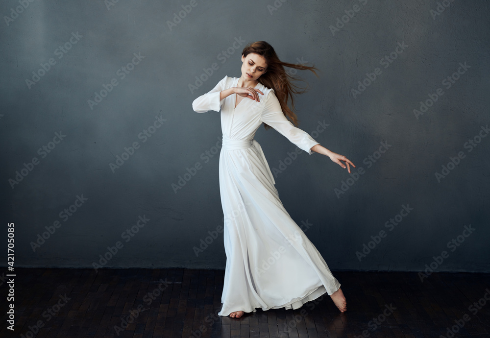 attractive woman in white dress dance performance charm gray background model attractive woman in white dress dance performance charm gray background model