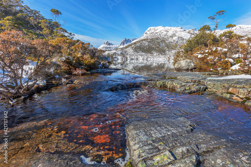 Beautiful  scenic   Lake Lilla . With snow covered Cradle Mountain in the distance. Cradle Mountain Lake St Clair National Park. Central Highlands of Tasmania  Australia.