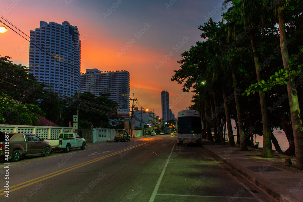 PATTAYA, THAILAND - January 19, 2019 :Sunset on a deserted Jomtiensaineung street in Pattaya,Thailand