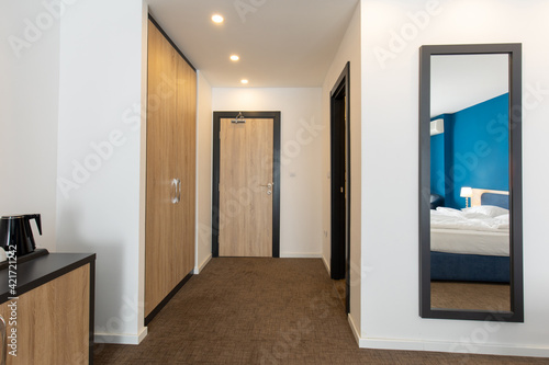 Hotel room entrance corridor with wooden closet © rilueda