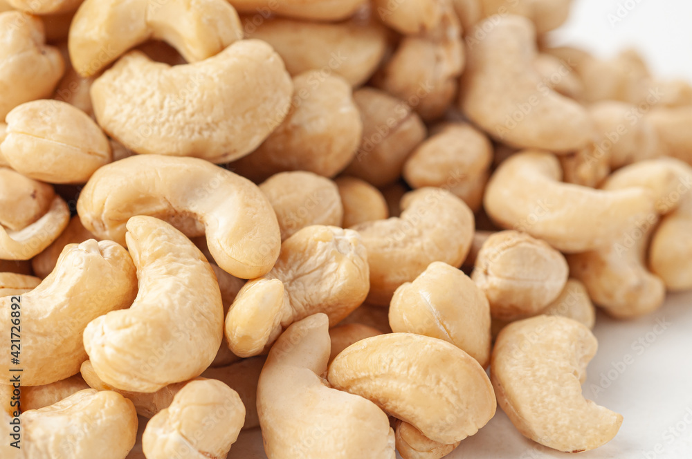 Cashew group. Close-up. White background . Isolated. Cashew group. Close-up. White background . Isolated.