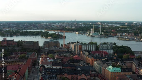 Stockholm, Sweden. Panoramic aerial flying drone view of Södermalm, Djurgården, amusement park Gröna Lund, water with boats and islands, the city, and archipelago.