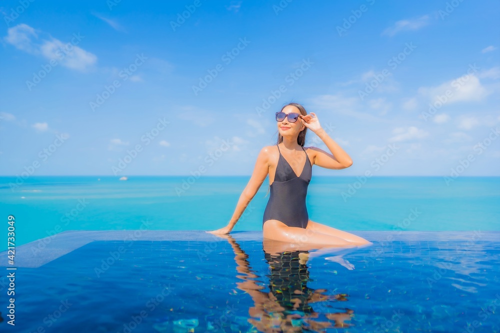 Portrait beautiful young asian woman relax smile leisure around outdoor swimming pool Portrait beautiful young asian woman relax smile leisure around outdoor swimming pool