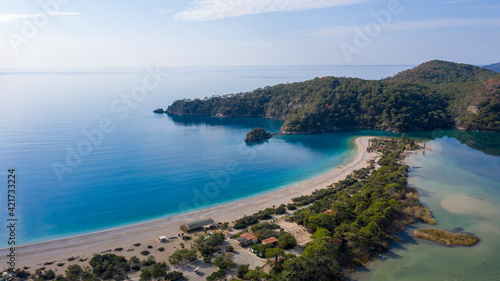 A fascinating view that has the unique nature of Oludeniz which is a county of Fethiye in Turkey. Because of its warm climate and fresh air, it has been an important destination to visit for tourists. © photograzon