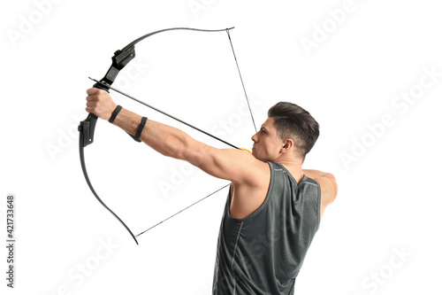 Fotografia Man with bow and arrow practicing archery on white background