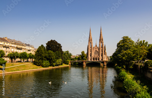 A nice view on The St. Paul's Church of Strasbourg, France. It is located on the point where the Ill and Aare rivers join. Beautiful sunny summer day.