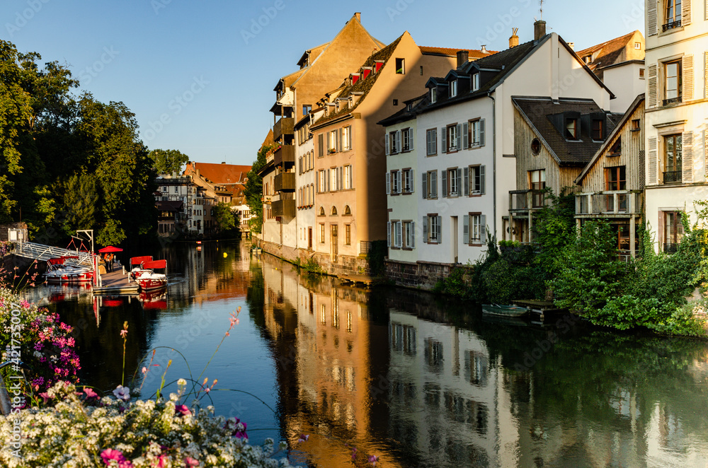 Strasbourg, France, August 2019. The historic center offers the view of pleasant and relaxing glimpse: the characteristic period houses are reflected on the water mirror of the canals.